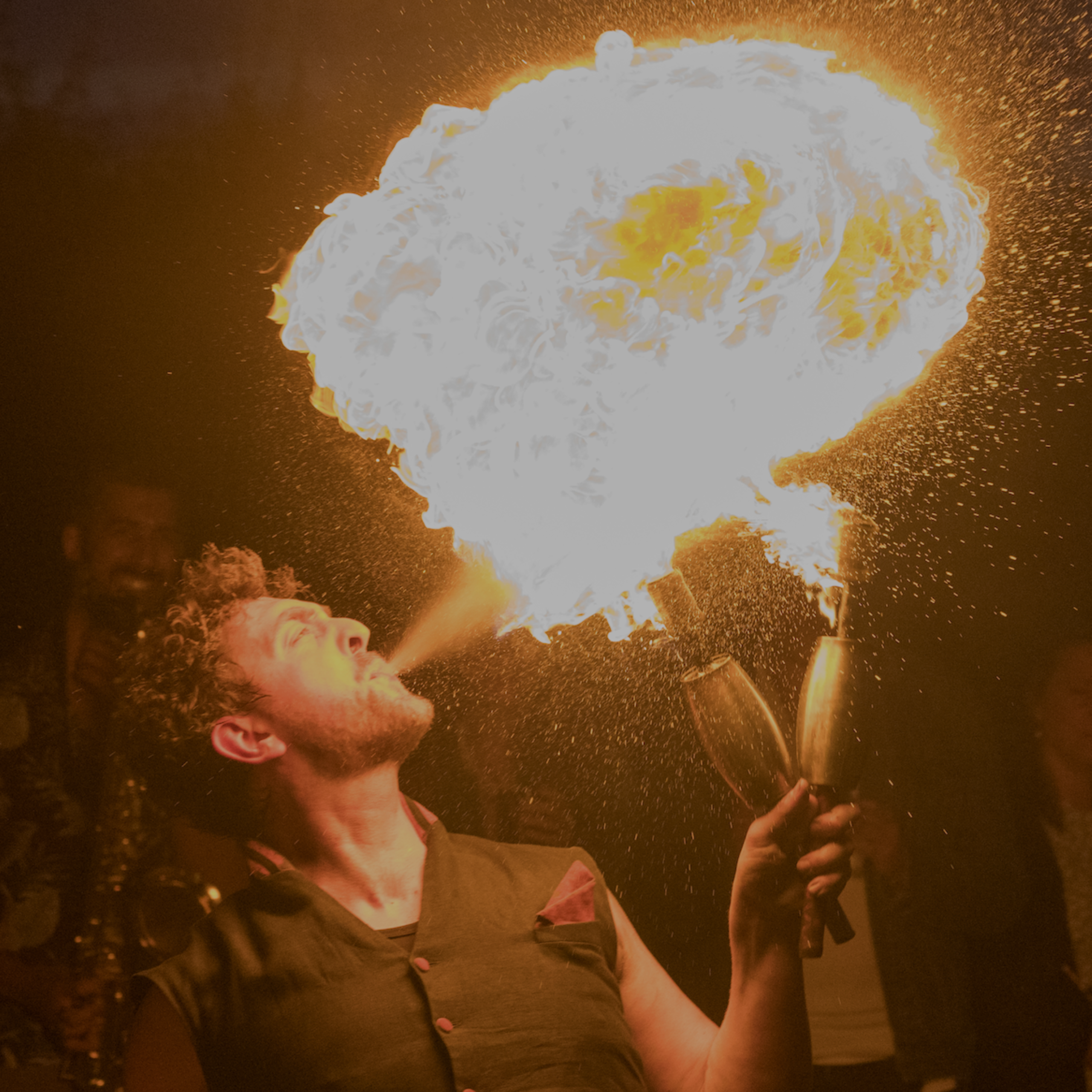 Fire breather performing at private event